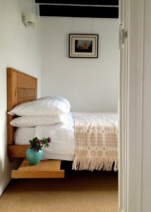 Ground floor bedroom with bespoke oak bed