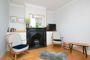 Feature fireplace with Icelandic sheepskin rug