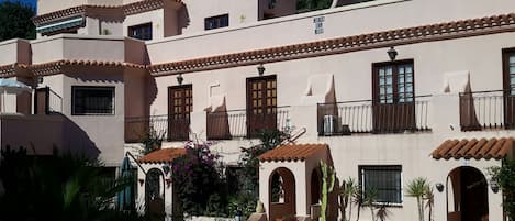 Our apartment is on the middle floor on the left, next to the pool.