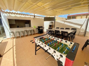 Shaded pool side DIning area 