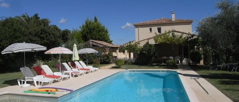 The pool in the back garden, looking towards the pool terrace