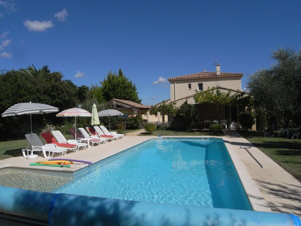 The pool in the back garden, looking towards the pool terrace