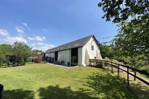 Harvest Moon, sleeps 8, is one of two adjacent properties at Lower Curscombe Barn, which together sleep 12