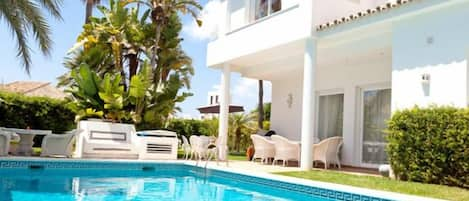 Private villa with pool in foreground