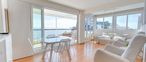 Sitting room and terrace overlooking Poniente beach