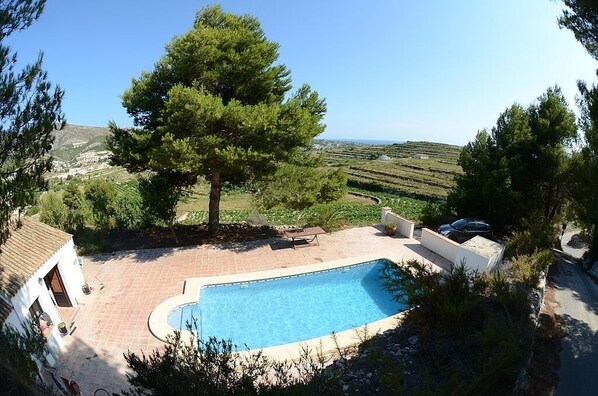 View across the pool to Moraira