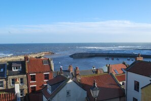 Amazing view of the harbour from the cottage living room.