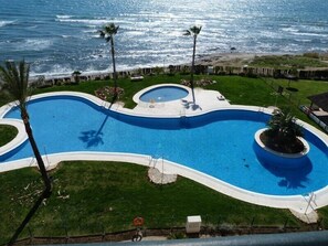 Main pool area with direct access to the beach