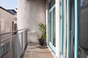 Balcony at rear of the apartment - accessible from both bedrooms - gets the morning sun.