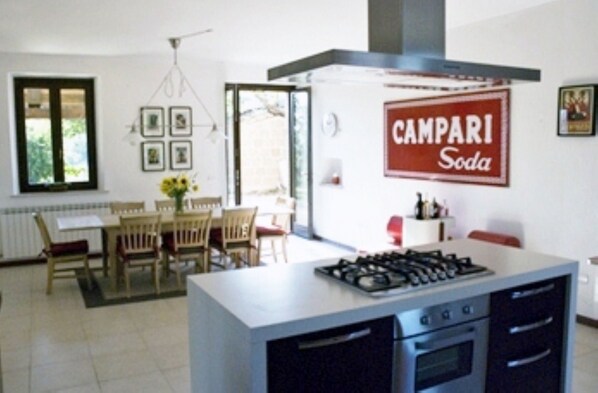 Large kitchen and diner with access to the capanna