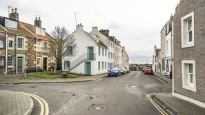 The cottage is located adjacent to the harbour.