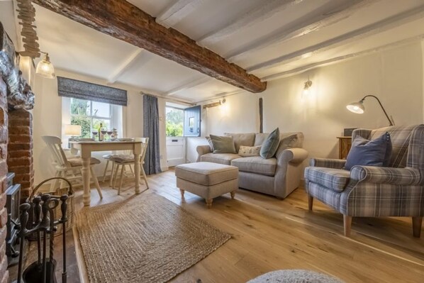 Muckledyke Cottage, Stiffkey: Charming sitting room with plenty of character