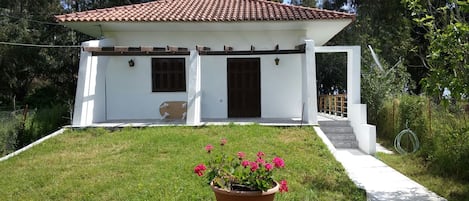 The villa from the gate entry. Back door leads to the beach, 30 meters away.