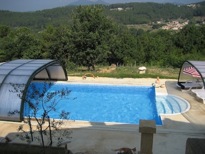 Luxurious, well appointed flat for 4 with solar heated pool, garden, sauna, view