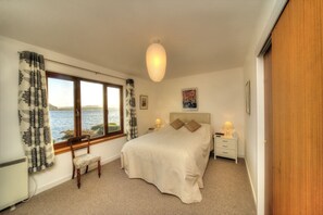 Bedroom 1 King size with view South East across the sea