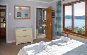 Bedroom 1 and shower room facing the sea