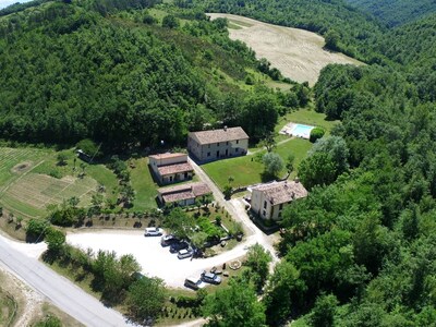 Located on the border between Marche and Umbria halfway between Gubbio and Urbino