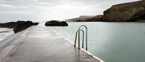 Bude sea pool nestled in the cliff in front of the Westcliff