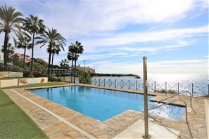 Lovely swimming pool by the beach