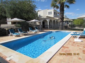 The modern heated private pool is an ideal spot to relax with family and friends