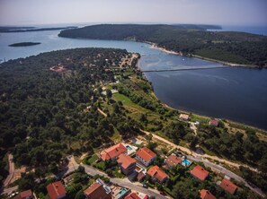 Aerial view . Our pool is the one you see front line to the sea