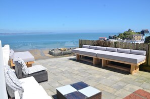 New outside seating benches with all-weather cushions (harbour/lifeboat view)