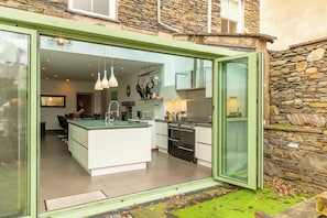 Bifold doors give free-flowing access to back garden