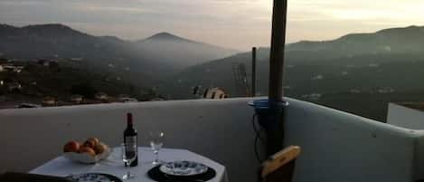 Chill out with a glass of wine and watch the sun go down over the valley.