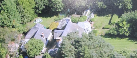 Aerial view, cottage on left.