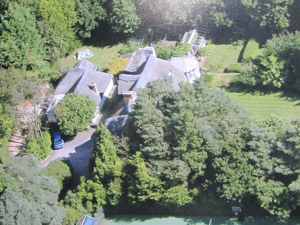 Aerial view, cottage on left.