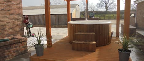 our new 6 person hot tub to hire towels and robes included