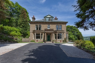 Large Edwardian Villa Set In Mature Woodland Gardens With Panoramic Views