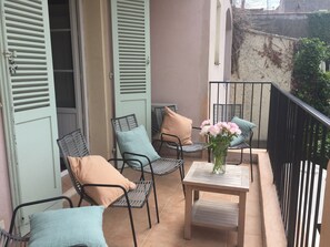 Terrace accessed from master bedroom with staircase access to garden
