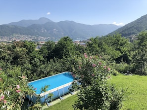 Pool, mountain and lake view from the main terrace 