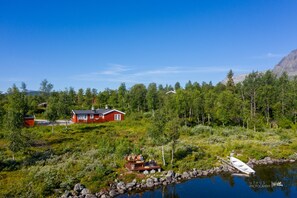 The lake, boat and cabin