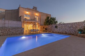 Pool area at sunset