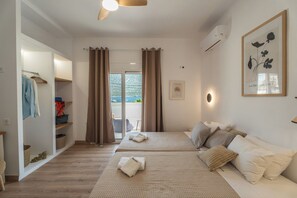 Each bedroom, a calm coastal haven.