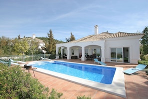 view over pool to villa
