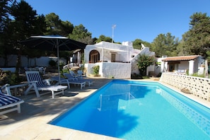 Main house, separate apartment to the right and pool area