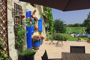 The lovely Terrace overlooking the pool with beautiful views