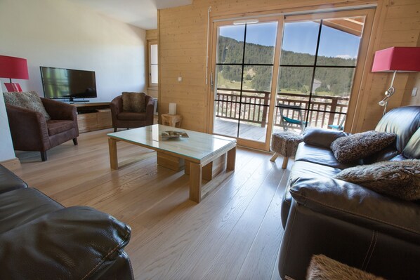 Open plan living with balcony