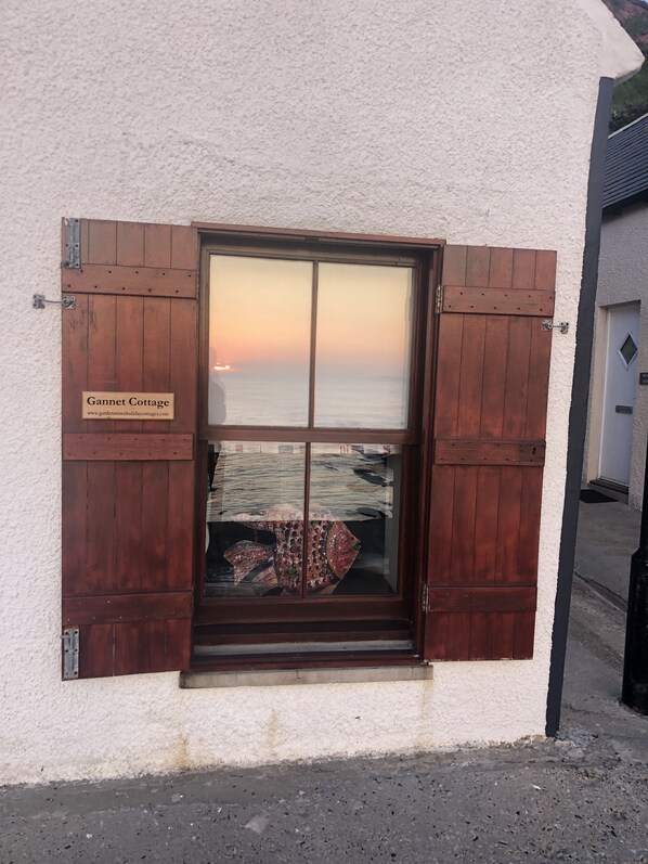 Reflection on Gannet Cottage window.