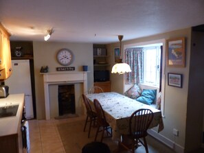 Dining area in kitchen. View out to rear garden.