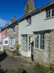 Hermosa periodo cabaña junto al mar en el centro de Swanage, los perros de bienvenida