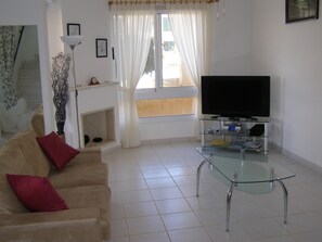 Lounge with large flat screen tv