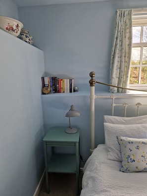 Pretty bedroom with  mix of old and new