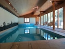 The 10m private heated pool with south-facing windows & doors to the garden.