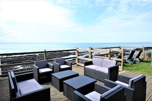 The deck with seating  and sea view