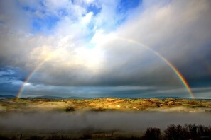 Our farmhouse, under a spectacular rainbow.