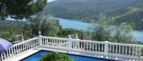 View of the pool and lake from the master balcony.